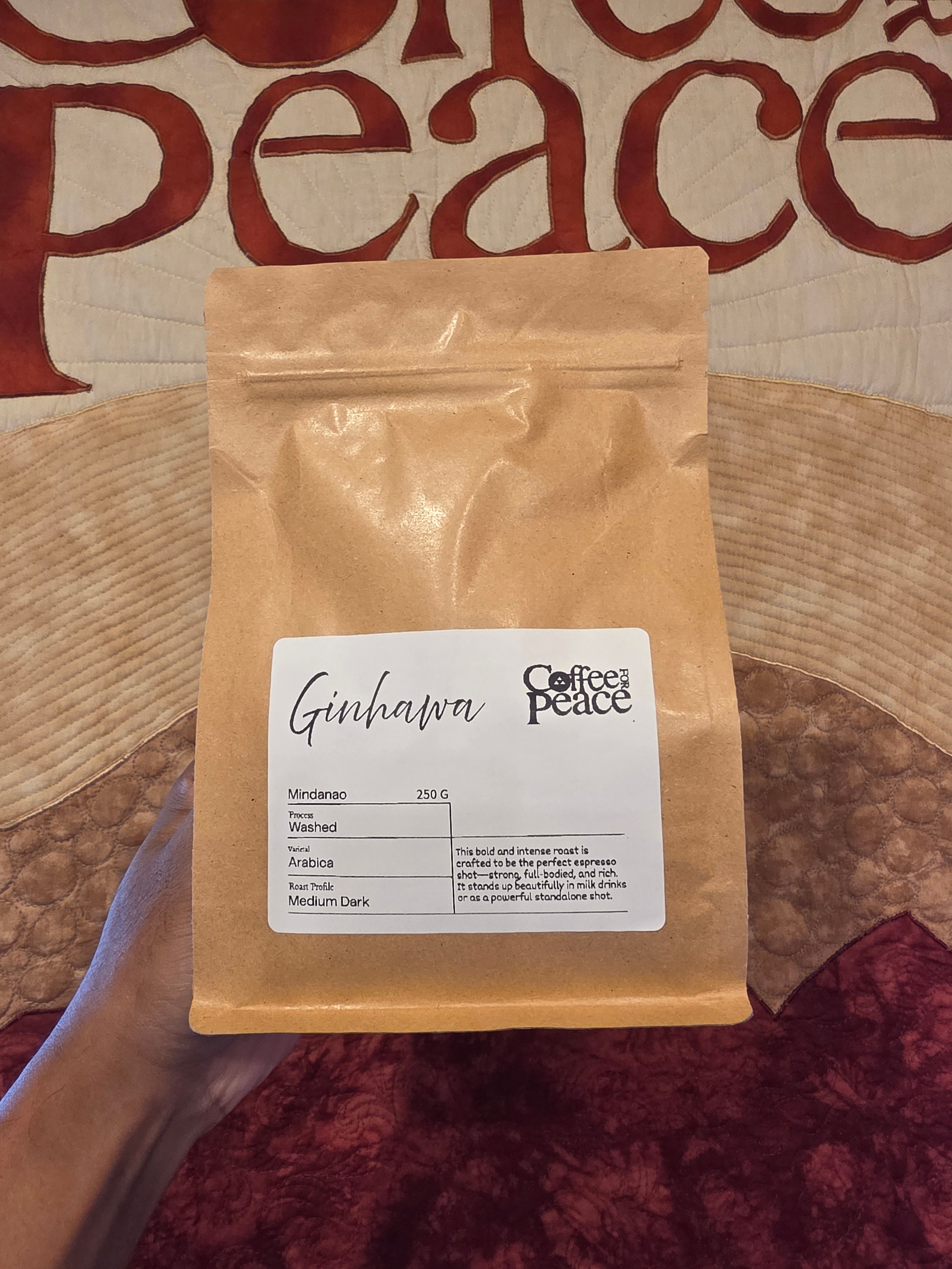 Gold packaging with a label on a textured surface